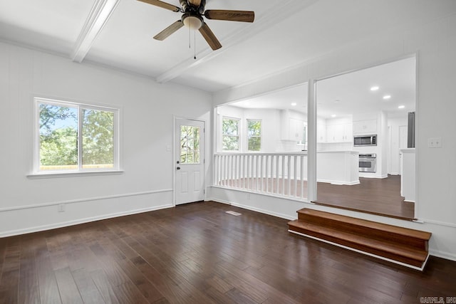 3 Poydras Dr, Little Rock, AR 72211 - empty room featuring beamed ceiling, plenty of natural light, ceiling fan, dark wood finished floors, and baseboards