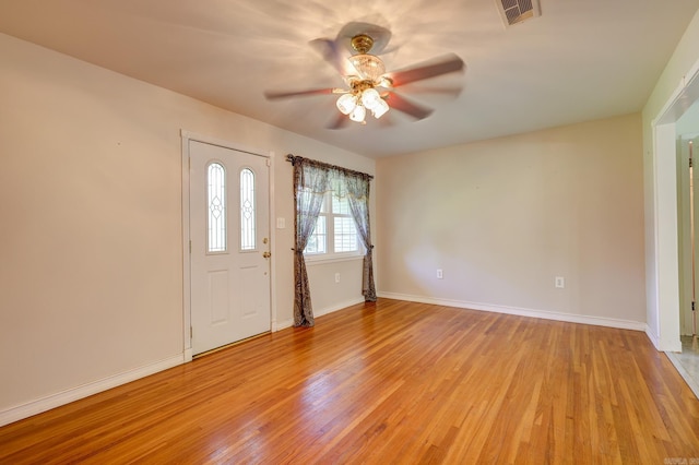 3508 Jack Mann Rd, Little Rock, AR 72210 - foyer with light wood-type flooring, ceiling fan, and baseboards