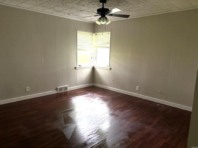 301 Coil, Steele, MO 63877 - spare room featuring an ornate ceiling, ceiling fan, wood finished floors, baseboards, and crown molding
