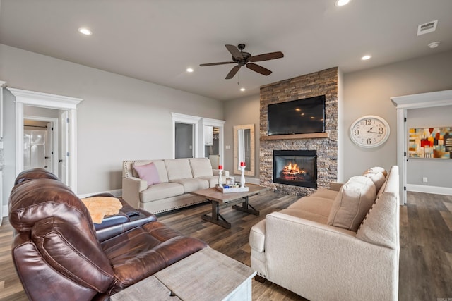 living room with ceiling fan, dark wood-style flooring, a fireplace, baseboards, and recessed lighting