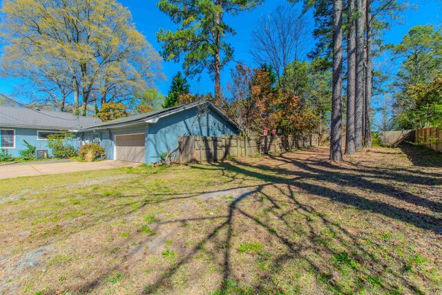 3110 Edison Ave, Benton, AR 72015 - view of yard with a garage and driveway