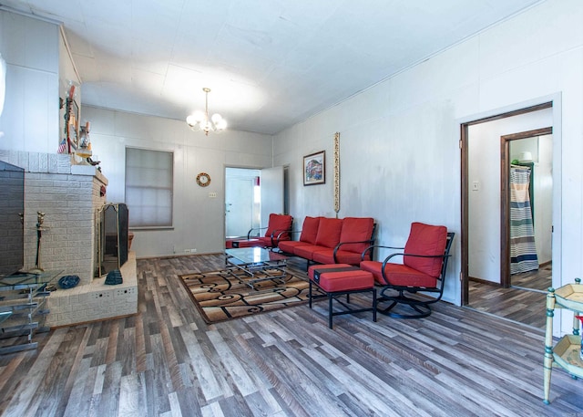 3110 Edison Ave, Benton, AR 72015 - living area with wood finished floors and a chandelier