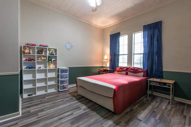 3110 Edison Ave, Benton, AR 72015 - bedroom featuring crown molding, wood finished floors, and baseboards