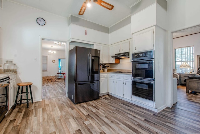 3110 Edison Ave, Benton, AR 72015 - kitchen with black appliances, crown molding, a ceiling fan, light wood-style floors, and white cabinetry