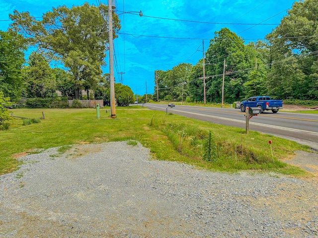 3106 Edison Ave, Benton, AR 72015 - view of asphalt road featuring street lighting