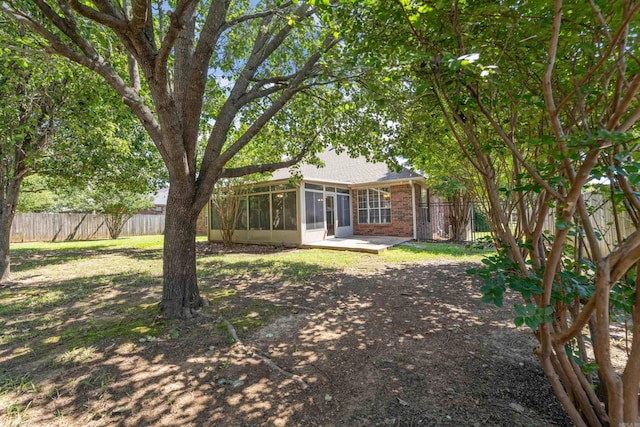 1045 Spatz Cir, Conway, AR 72034 - view of yard featuring a sunroom