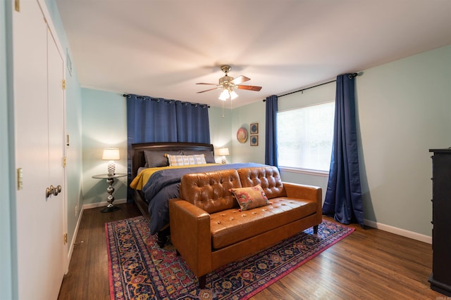 6924 W Markham St, Little Rock, AR 72205 - bedroom featuring baseboards, wood finished floors, and a ceiling fan