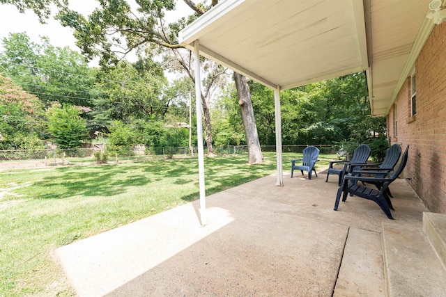 6924 W Markham St, Little Rock, AR 72205 - view of patio / terrace with view of scattered trees