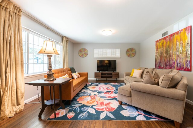 6924 W Markham St, Little Rock, AR 72205 - living area with wood finished floors and baseboards