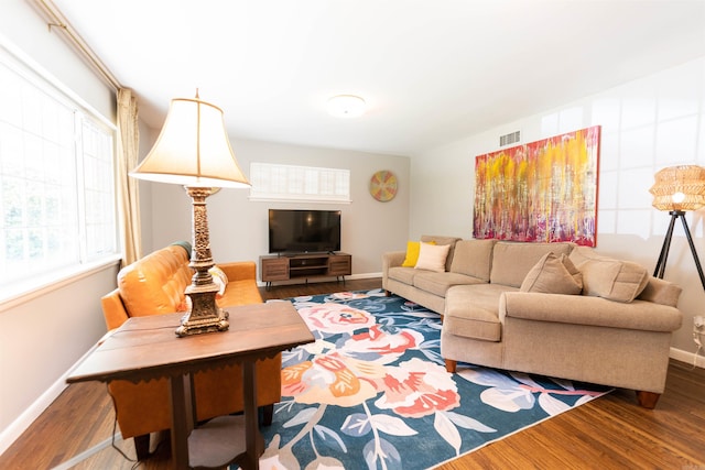 6924 W Markham St, Little Rock, AR 72205 - living area with baseboards and wood finished floors