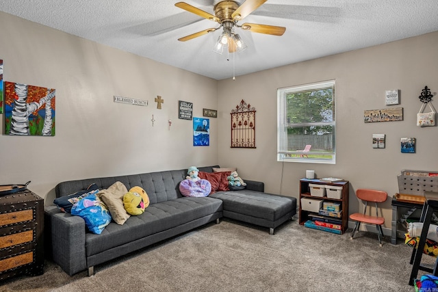 carpeted living room with a ceiling fan and a textured ceiling