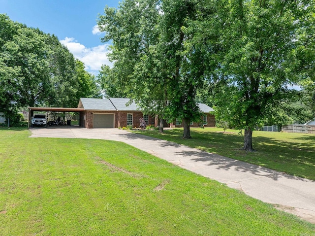 single story home featuring a carport, an attached garage, concrete driveway, and brick siding