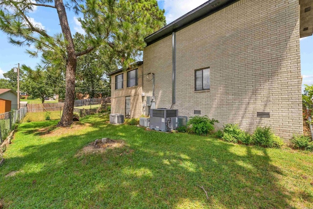 6500 W 12th St, Little Rock, AR 72204 - view of side of home featuring central AC unit and crawl space