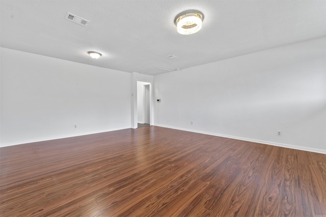 6500 W 12th St, Little Rock, AR 72204 - unfurnished room with dark wood finished floors and baseboards