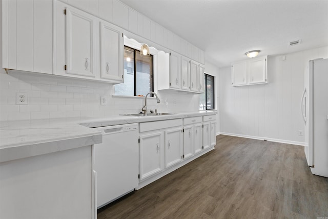 6500 W 12th St, Little Rock, AR 72204 - kitchen with white appliances, a sink, white cabinetry, backsplash, and light countertops