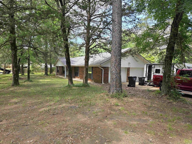 535 Ridgeview Ln, Russellville, AR 72802 - view of front facade featuring brick siding and a garage