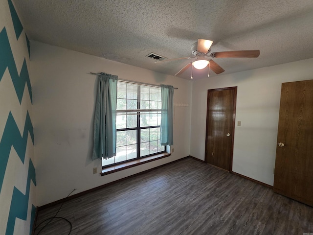 535 Ridgeview Ln, Russellville, AR 72802 - unfurnished room with wood finished floors, a ceiling fan, a textured ceiling, and baseboards