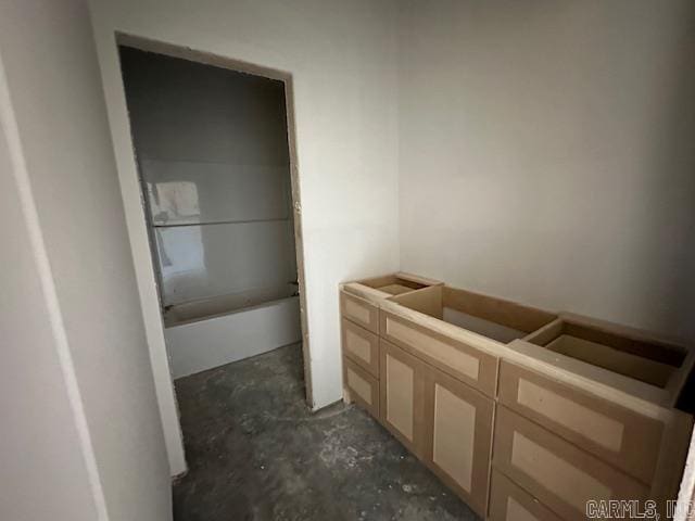 1168 Duke Dr, Bauxite, AR 72011 - bathroom with unfinished concrete flooring and a bathtub
