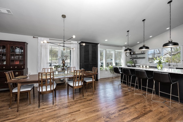 2803 Dalewood Rd, Little Rock, AR 72207 - dining space with wood finished floors, a chandelier, lofted ceiling, and recessed lighting