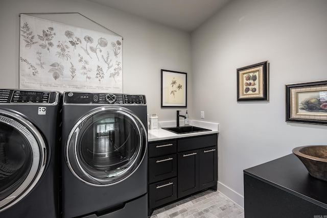 2803 Dalewood Rd, Little Rock, AR 72207 - laundry area featuring washing machine and clothes dryer, baseboards, and cabinet space