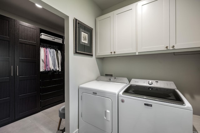 2803 Dalewood Rd, Little Rock, AR 72207 - laundry room with cabinet space, separate washer and dryer, and light tile patterned floors