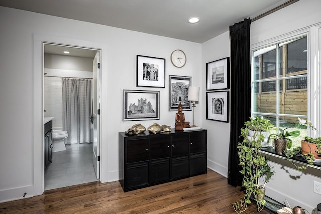 2803 Dalewood Rd, Little Rock, AR 72207 - hall with dark wood finished floors, recessed lighting, and baseboards