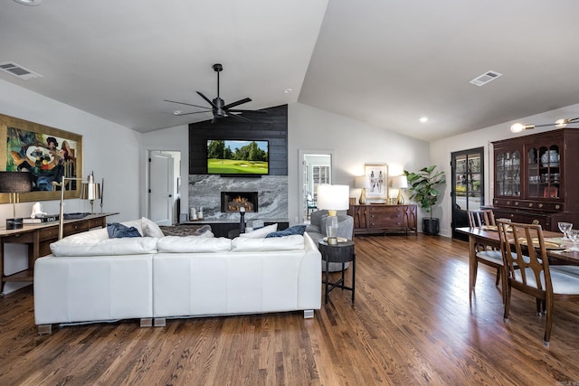 2803 Dalewood Rd, Little Rock, AR 72207 - living room featuring lofted ceiling, wood finished floors, a ceiling fan, and a premium fireplace