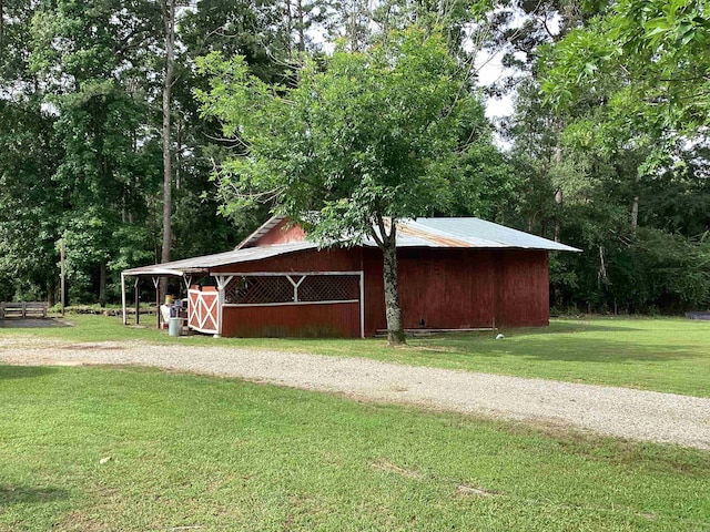 228 Nevada 66 W, Prescott, AR 71857 - view of pole building with a lawn