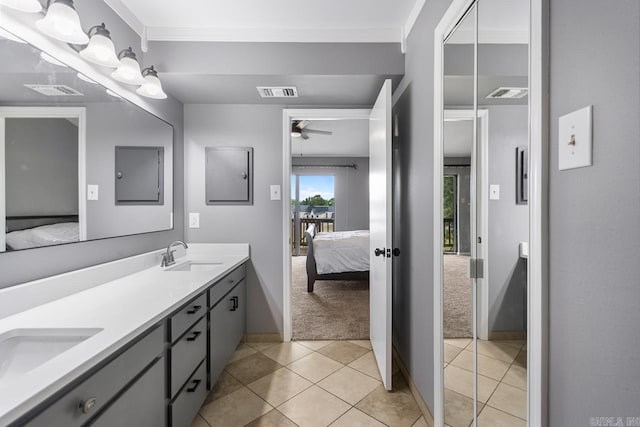 38 Ninth Fairway Loop, Maumelle, AR 72113 - full bathroom with ensuite bath, double vanity, a ceiling fan, tile patterned flooring, and ornamental molding