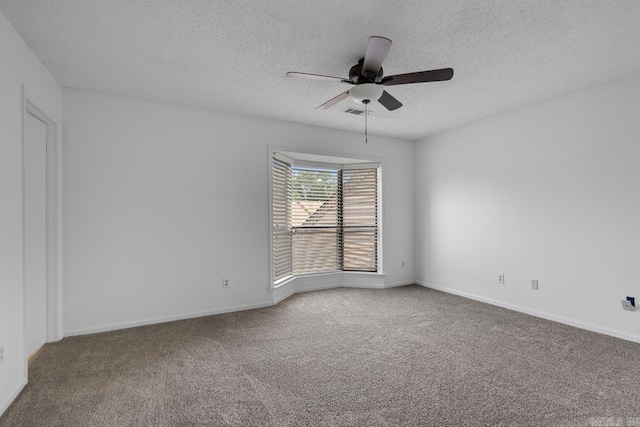 38 Ninth Fairway Loop, Maumelle, AR 72113 - carpeted spare room with a textured ceiling, a ceiling fan, and baseboards