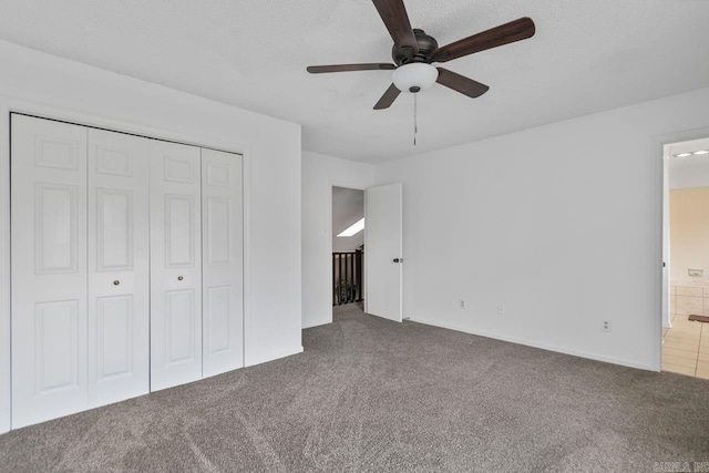 38 Ninth Fairway Loop, Maumelle, AR 72113 - unfurnished bedroom with carpet flooring, connected bathroom, a closet, and a ceiling fan