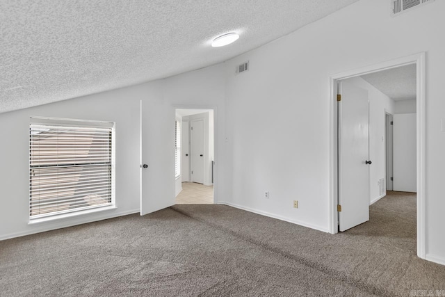 38 Ninth Fairway Loop, Maumelle, AR 72113 - carpeted empty room featuring a textured ceiling and lofted ceiling