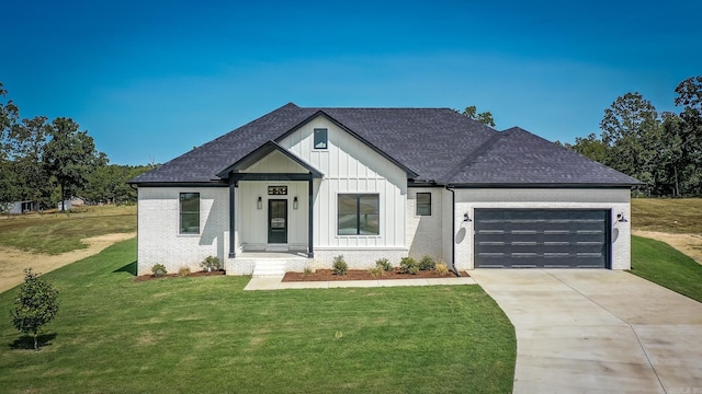 57 Republican Loop, Greenbrier, AR 72058 - modern inspired farmhouse with brick siding, a garage, a front lawn, and a shingled roof