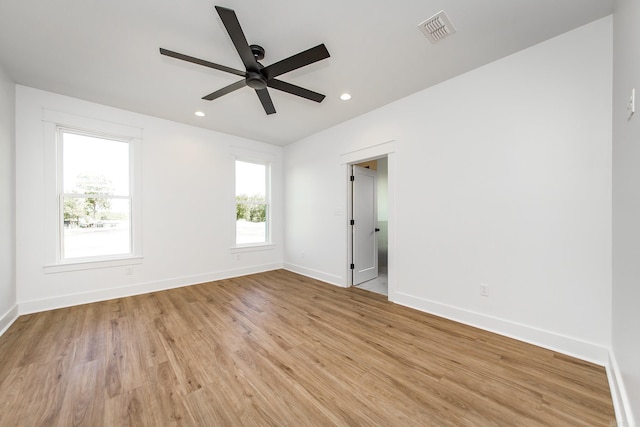 57 Republican Loop, Greenbrier, AR 72058 - empty room with ceiling fan, baseboards, light wood-style floors, and recessed lighting