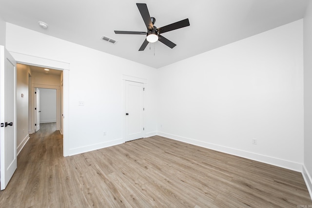 57 Republican Loop, Greenbrier, AR 72058 - empty room with wood finished floors, ceiling fan, and baseboards