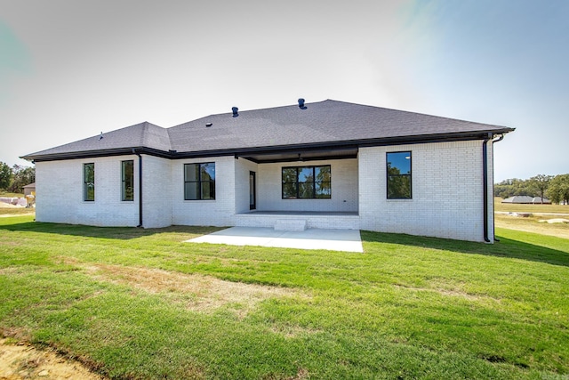 57 Republican Loop, Greenbrier, AR 72058 - rear view of house with a patio, brick siding, a lawn, and a shingled roof