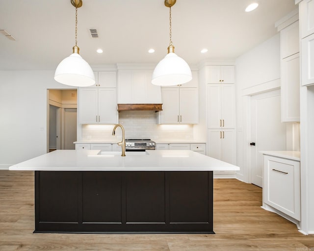 57 Republican Loop, Greenbrier, AR 72058 - kitchen with light countertops, electric stove, backsplash, and recessed lighting