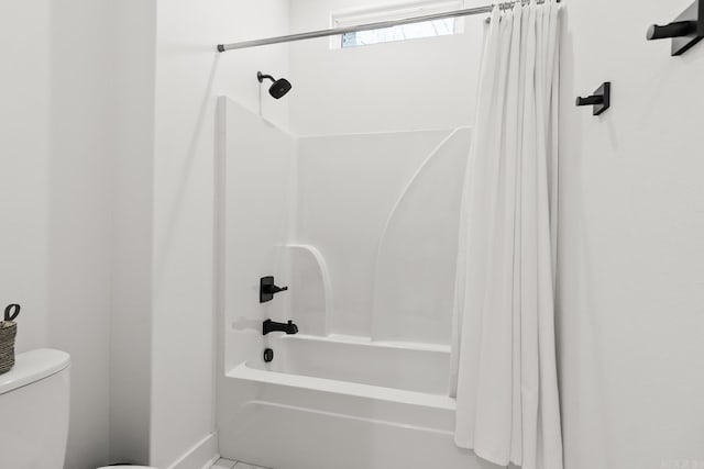 2505 Collins Dr, Conway, AR 72058 - full bath featuring shower / bath combo, toilet, and baseboards