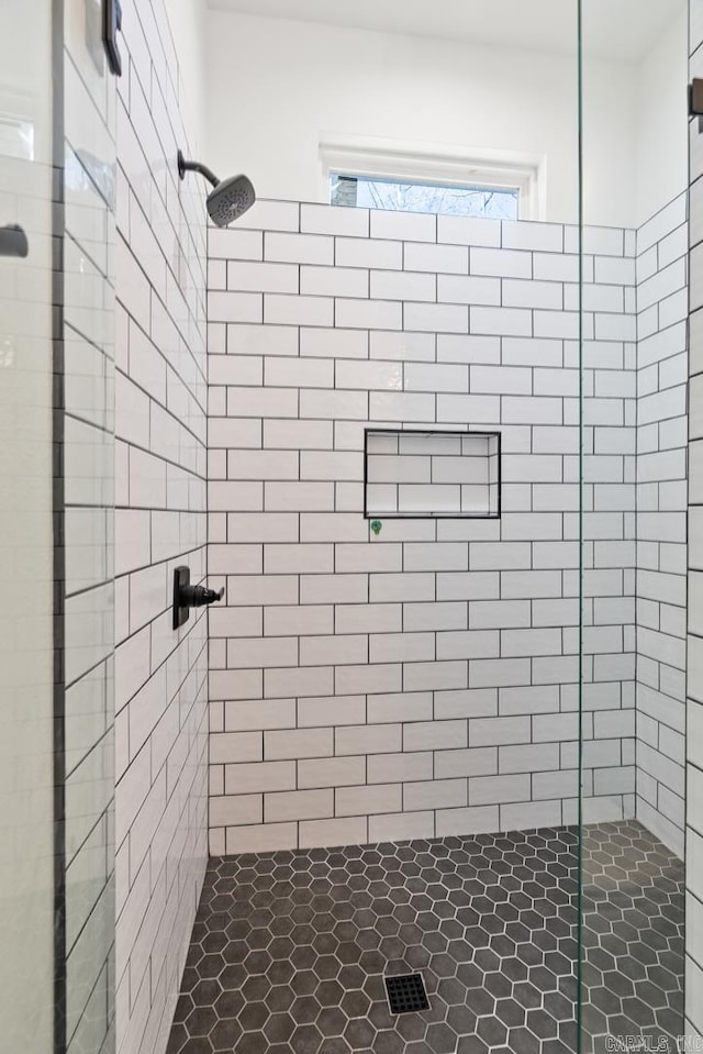 2505 Collins Dr, Conway, AR 72058 - bathroom featuring tiled shower
