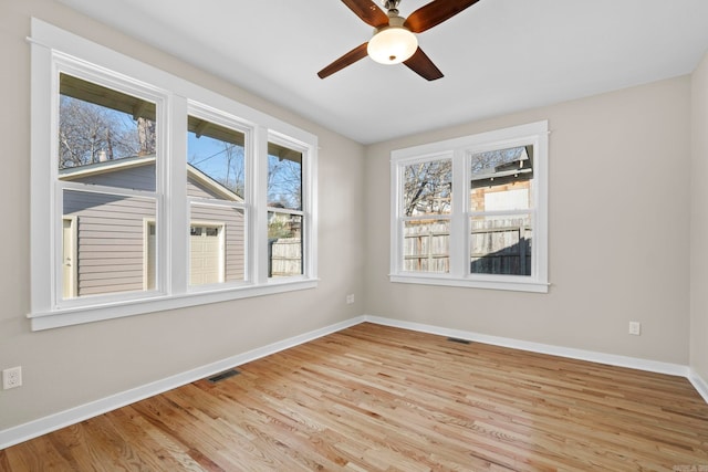212 Barton St, Little Rock, AR 72205 - empty room featuring a ceiling fan, wood finished floors, and baseboards
