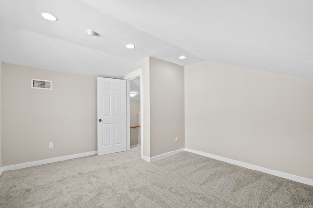 212 Barton St, Little Rock, AR 72205 - additional living space with lofted ceiling, light carpet, recessed lighting, and baseboards