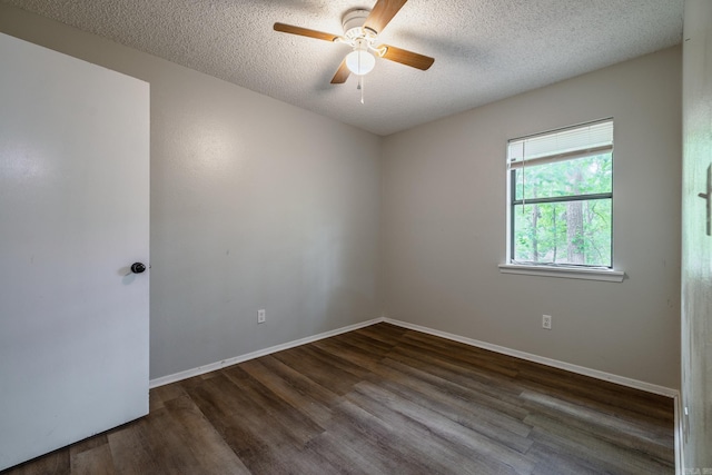 1716 Walnut St, Arkadelphia, AR 71923 - empty room featuring ceiling fan, wood finished floors, a textured ceiling, and baseboards
