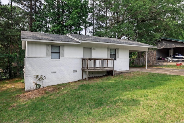 1716 Walnut St, Arkadelphia, AR 71923 - view of front of house with driveway, a front yard, an attached carport, and roof with shingles