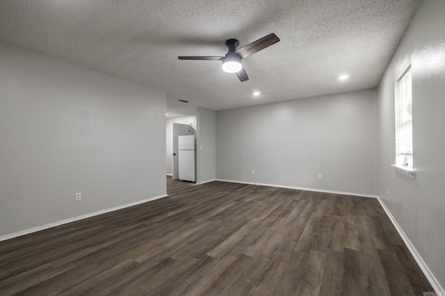 1716 Walnut St, Arkadelphia, AR 71923 - unfurnished room with a ceiling fan, dark wood-type flooring, a textured ceiling, and baseboards
