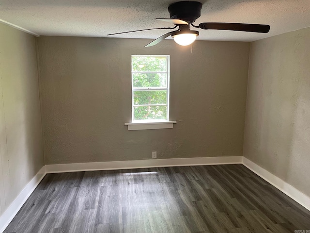 202 Roosevelt, Jacksonville, AR 72076 - unfurnished room with dark wood-style floors, ceiling fan, a textured ceiling, baseboards, and a textured wall