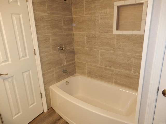 100 Douglas, Judsonia, AR 72180 - full bathroom with wood finished floors and bathtub / shower combination