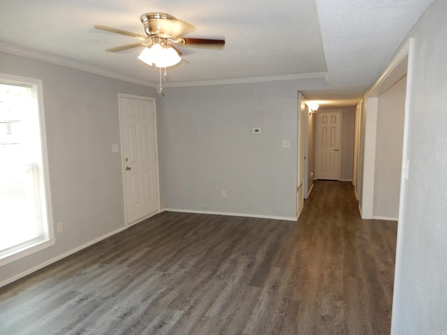 100 Douglas, Judsonia, AR 72180 - empty room with dark wood-style flooring, crown molding, ceiling fan, and baseboards