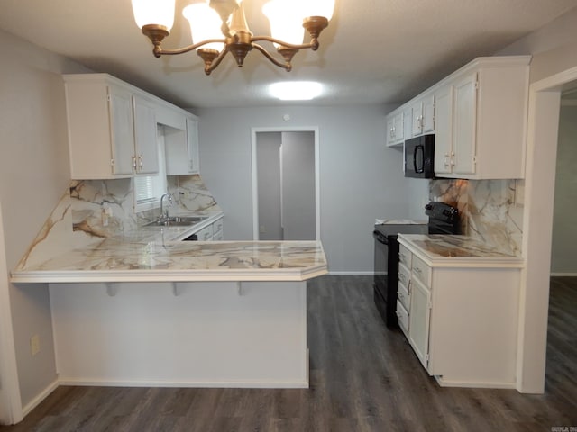 100 Douglas, Judsonia, AR 72180 - kitchen featuring black appliances, a sink, a chandelier, light countertops, and decorative backsplash