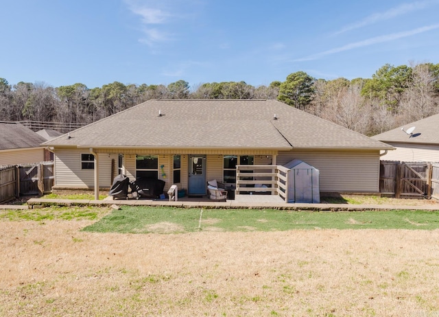1324 Hunter Wood, Bryant, AR 72022 - back of house with a gate, a patio area, and a shingled roof