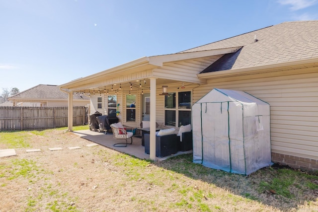 1324 Hunter Wood, Bryant, AR 72022 - rear view of house with a patio area and roof with shingles